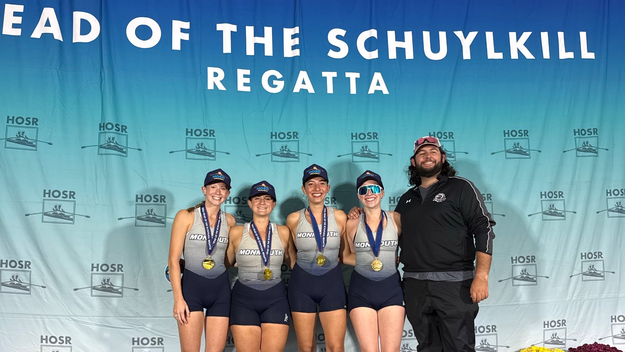 Liz Coffman, Molly Gross Eli Haragism, Anna Ciardiello stands with Coach TJ Scarpa and their medals at the Head of the Schuylkill