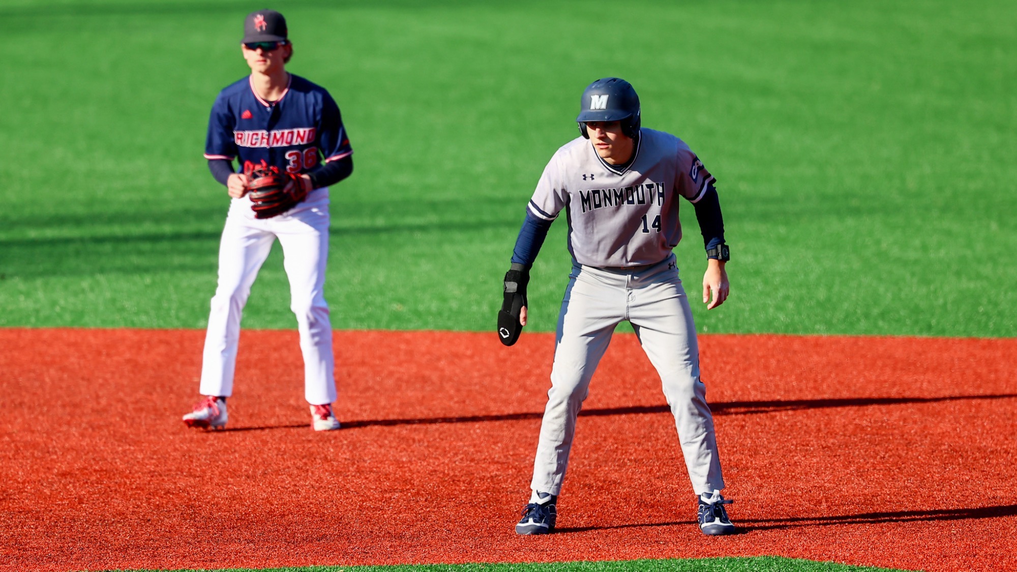 Sam Saucke leads off second base with the shortstop in the background