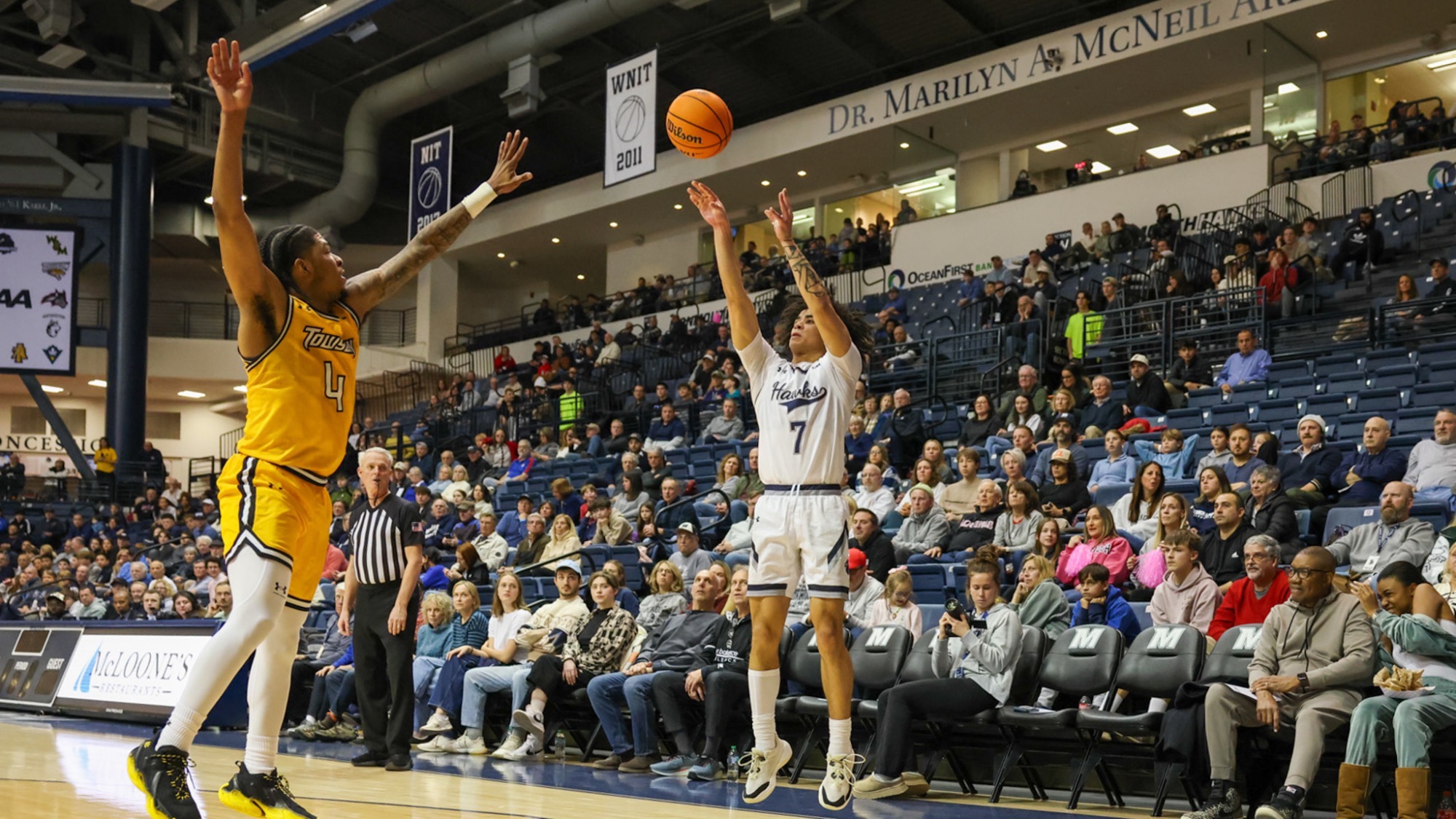 Justin Ray takes a three-pointer against Towson