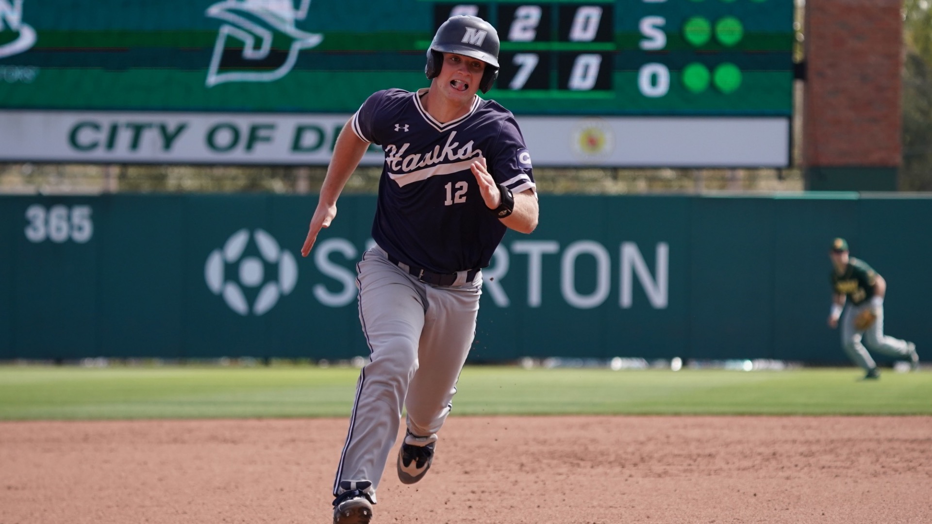 Brendan Buecker runs the bases