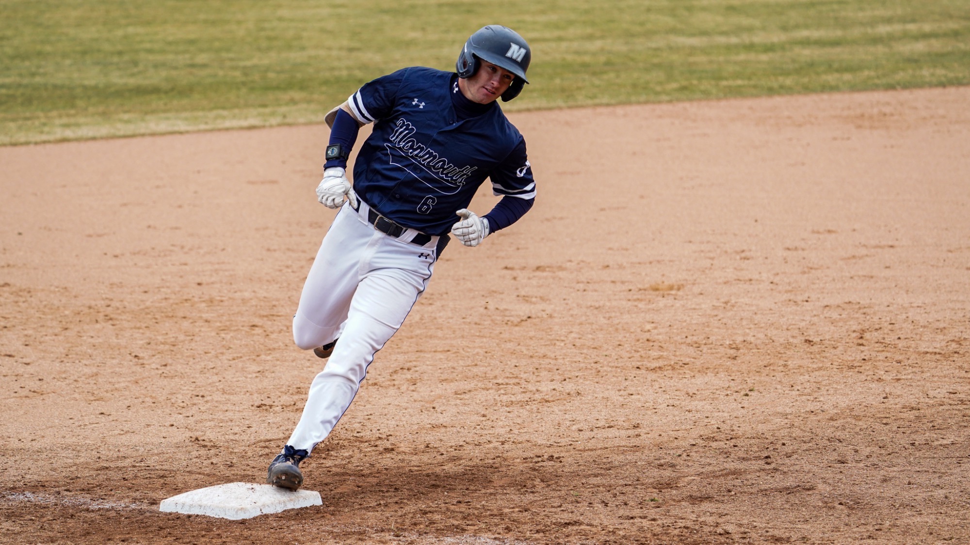 Colin Richter runs over third base