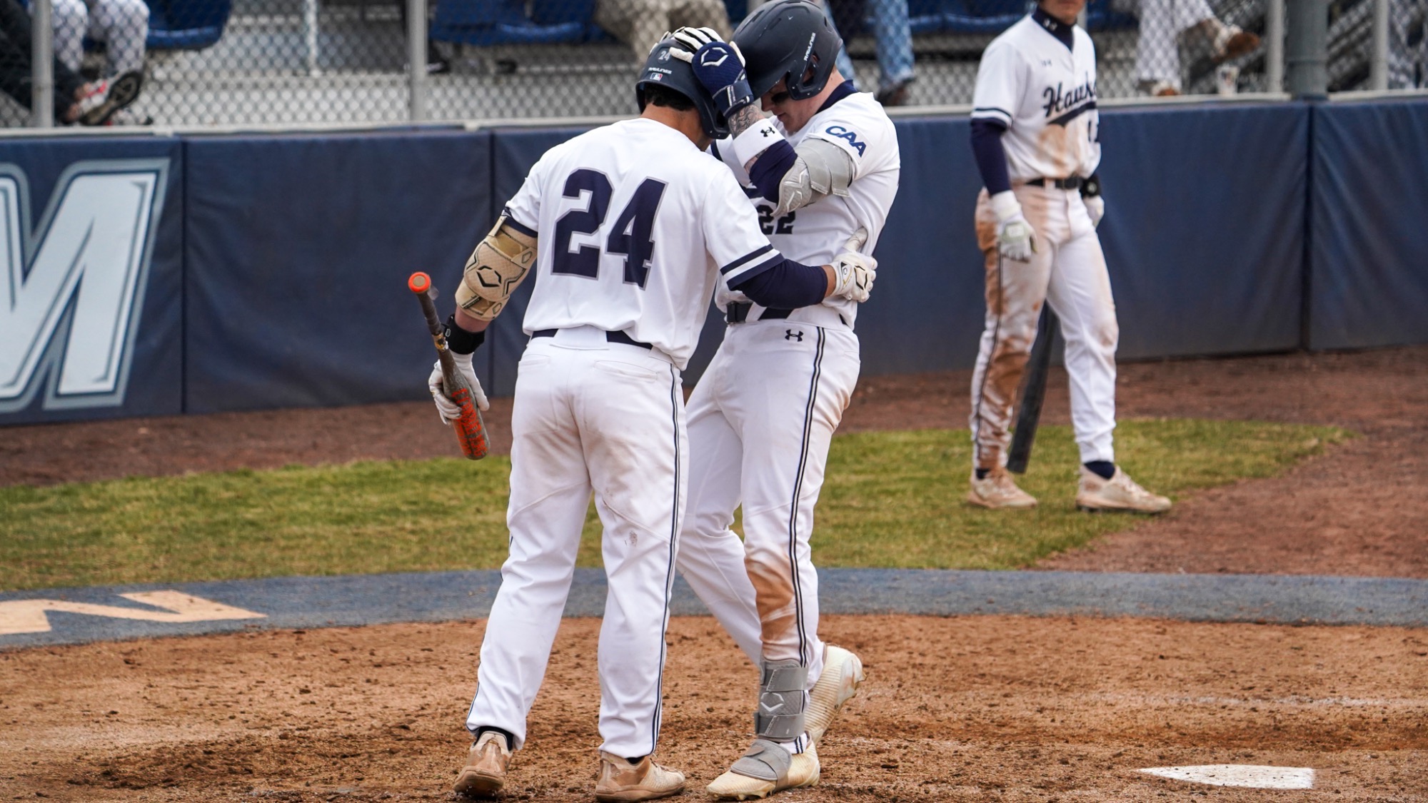 RJ Mustaro and Nick Lovarco celebrate a home run at the plate