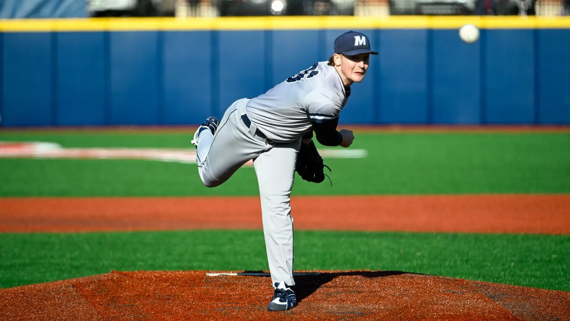 Kevin Opanel follows through after throwing a pitch