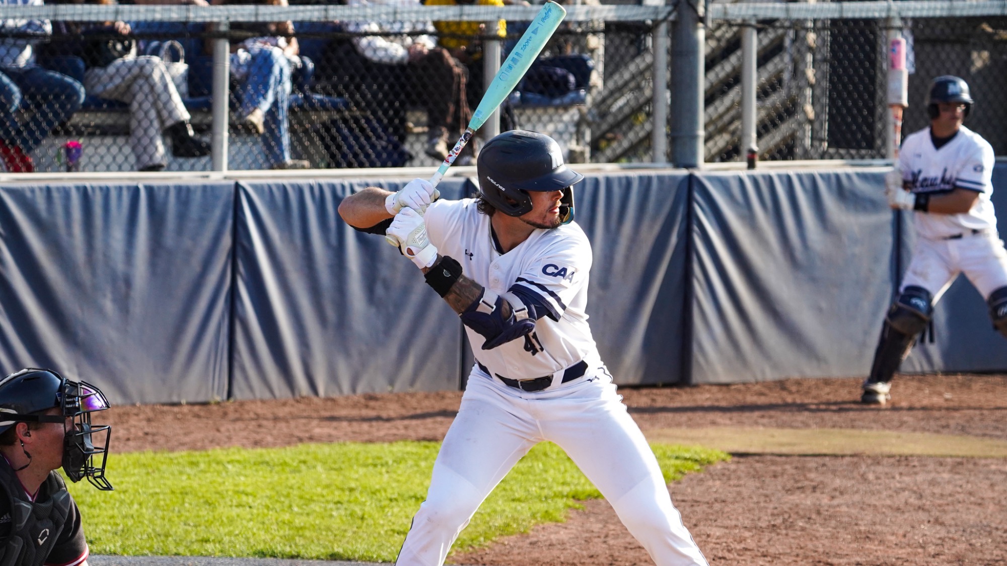 Graedon Finarelli stands at the plate with his bat on his shoulder ready to hit