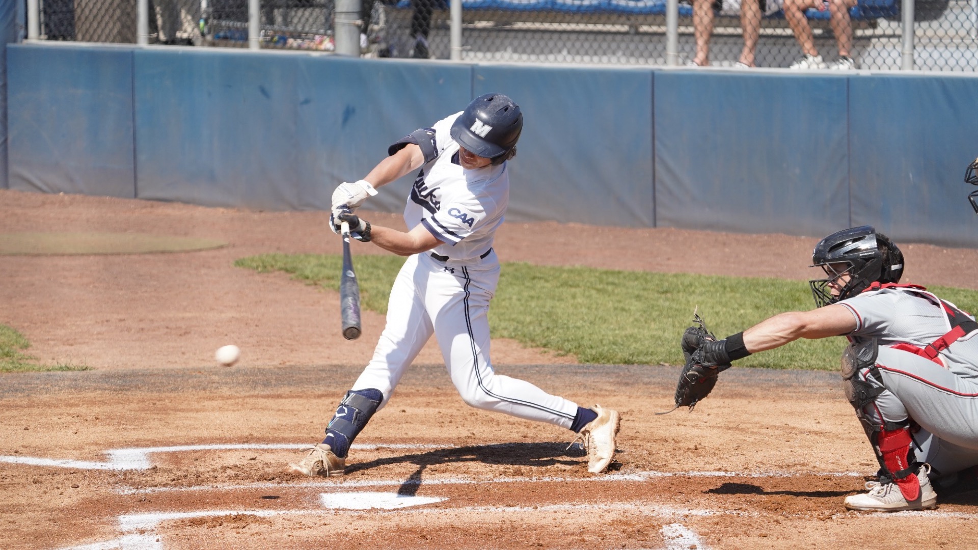 Wyatt Hunt swings and connects with the ball