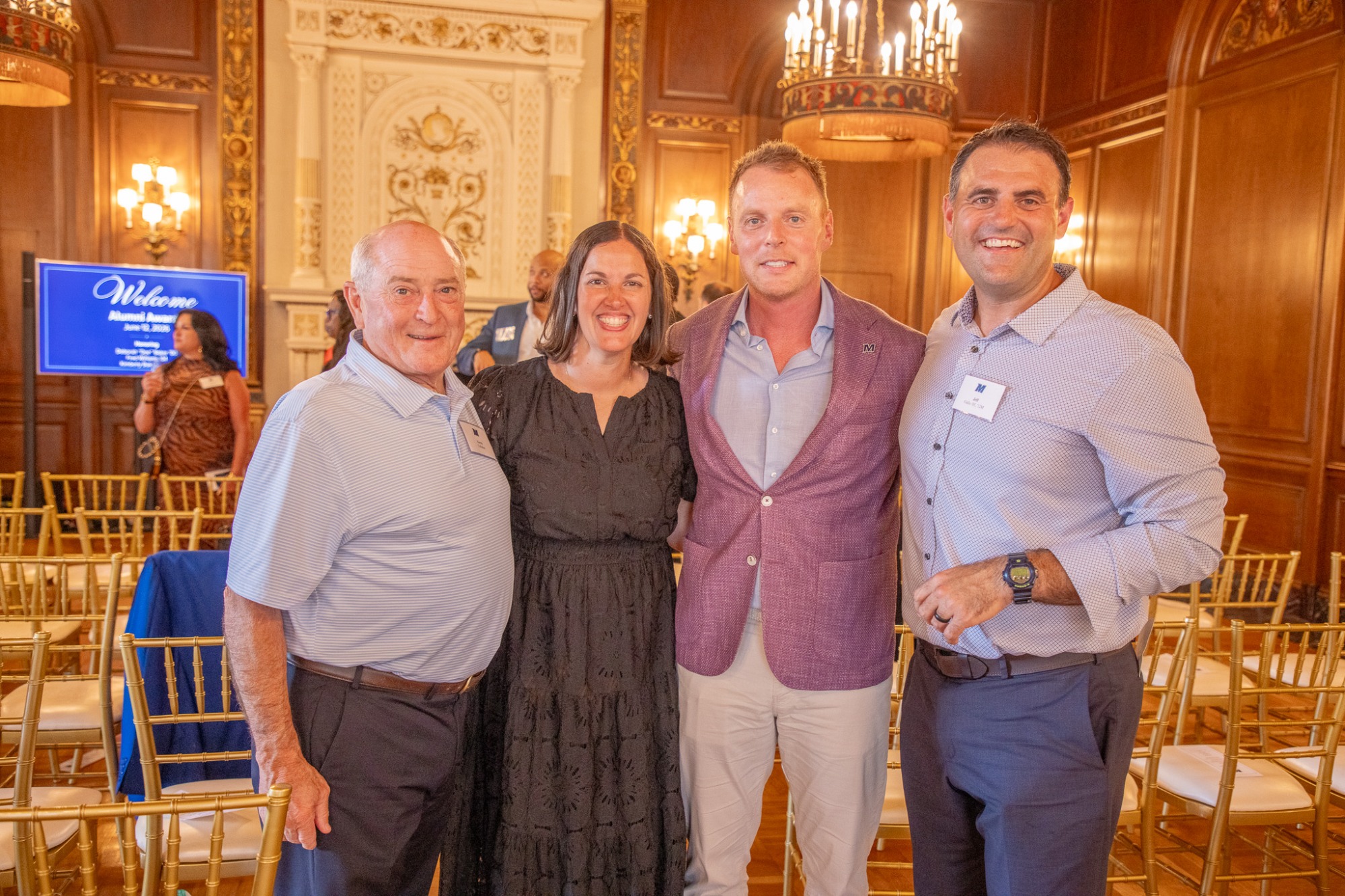 Coach Kevin Callahan, Director of Athletics Jennifer Sansevero, Fred Williams '04 and coach Jeff Gallo