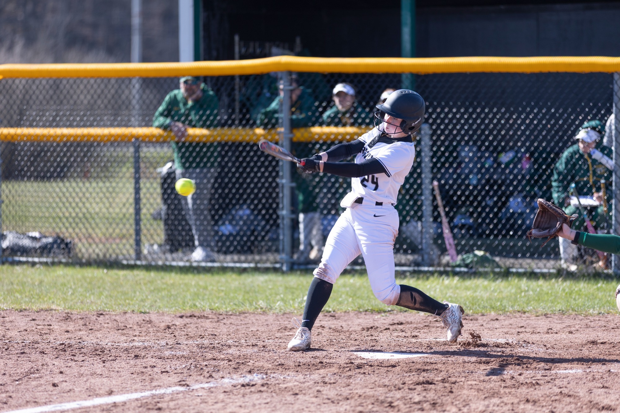 Morrisville Softball with a hit at home plate