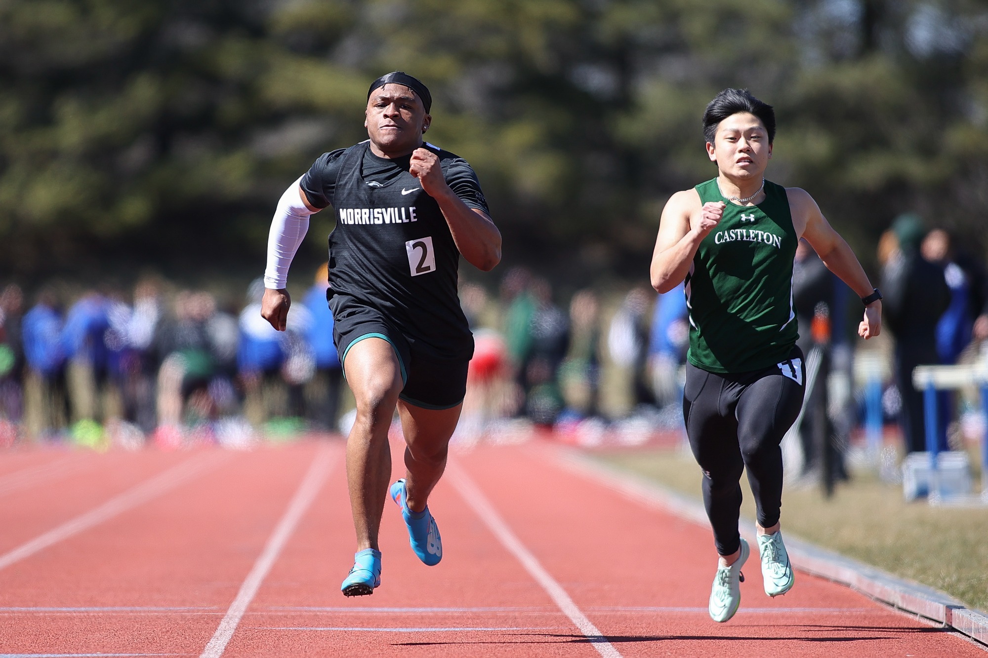 Morrisville men's track near finish line in 100 meter dash