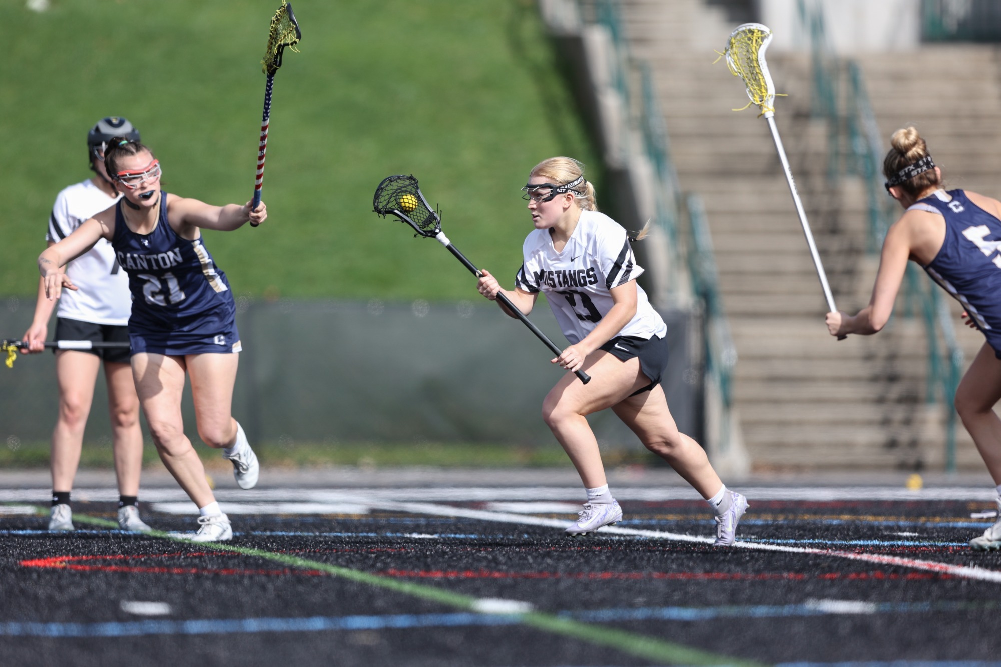 Savanna Scheifla running upfield with the ball