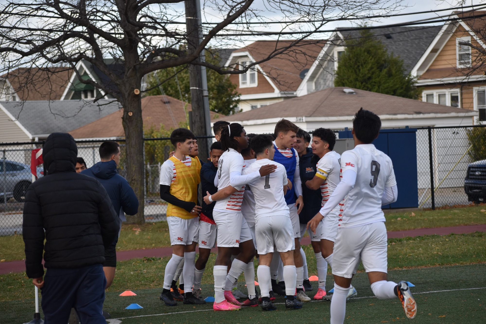 Mens soccer celebrates win