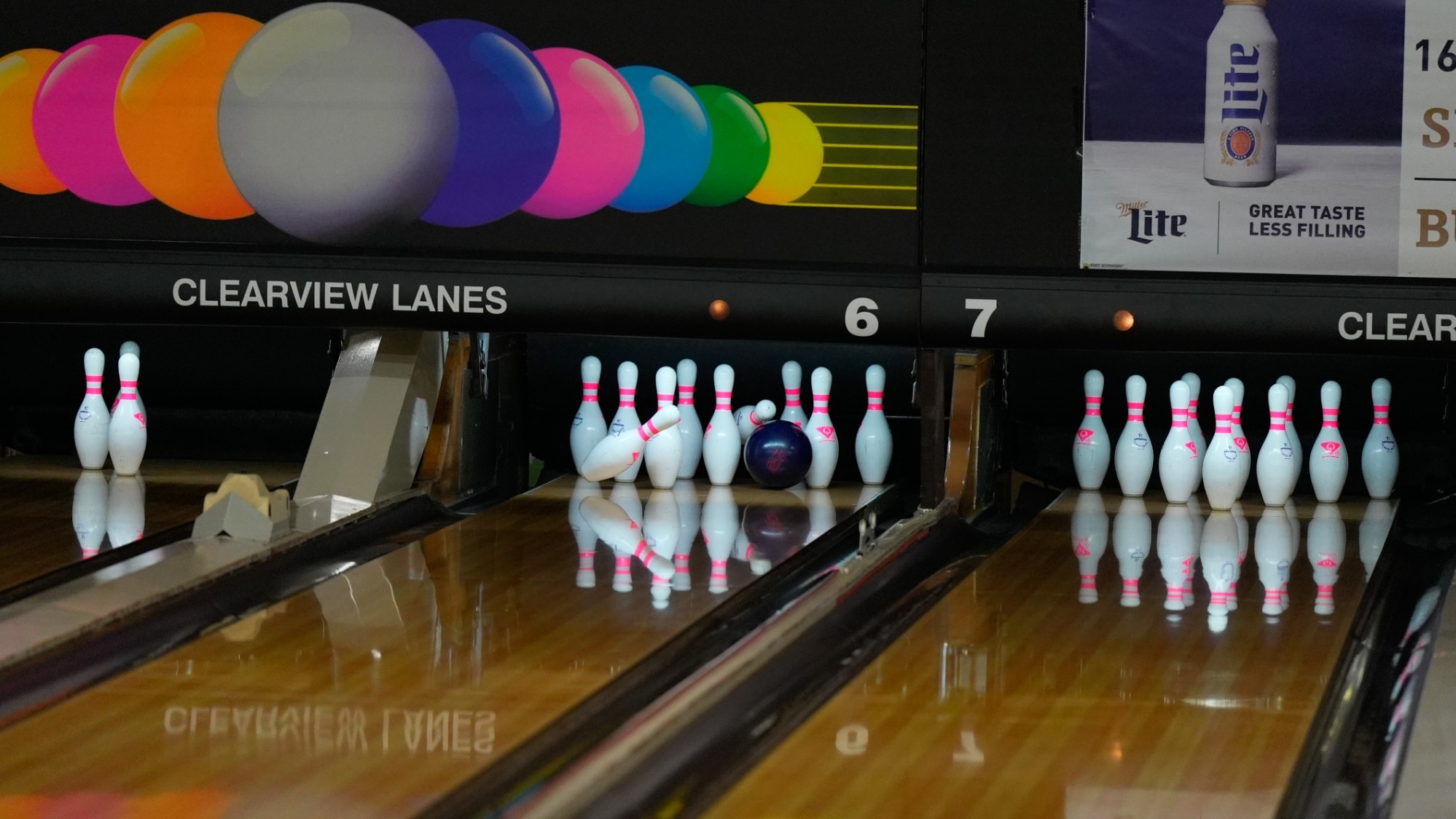 Bowling Pins Being Knocked Down