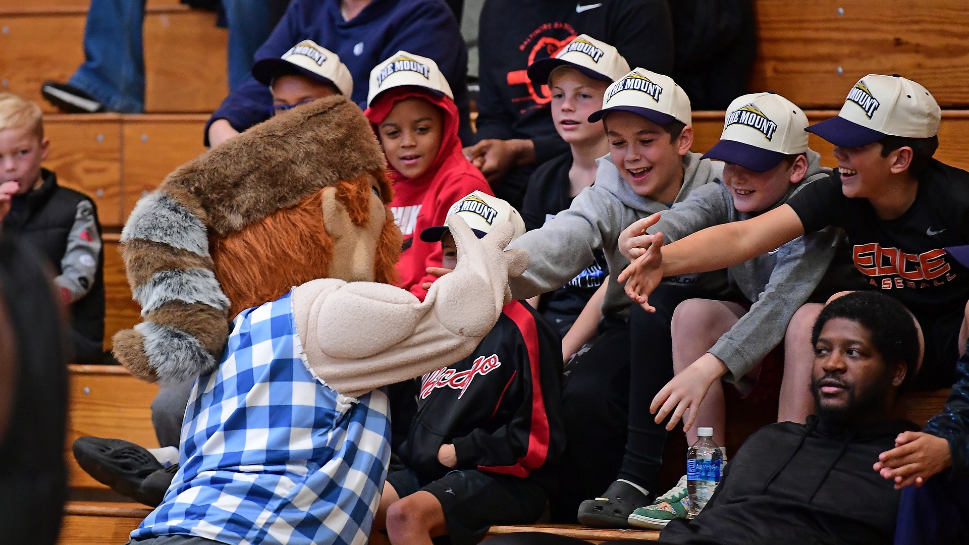 Kids Hi-Fiving Emmit Before Game