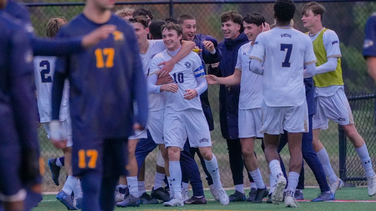 Team Embraces Graham Dougald Post Goal Celebration