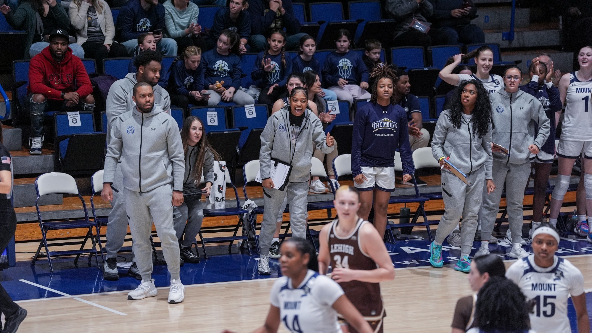The Women's Basketball Bench Celebrates a Play Against Lehigh
