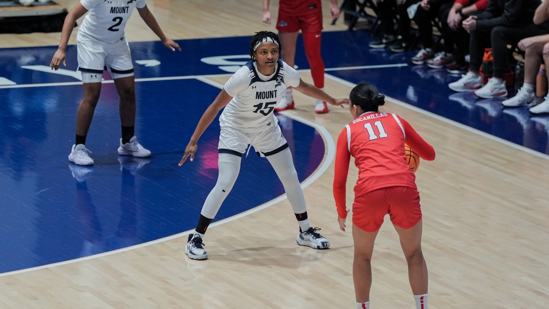 Gabrielle Kennerly Guarding a Marist Defender