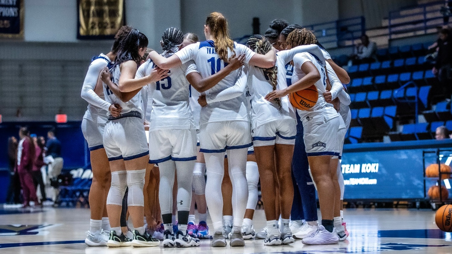 Moutaineers Gather in a Huddle