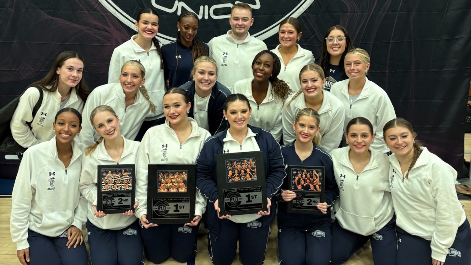 Dance Team With Regional Trophies