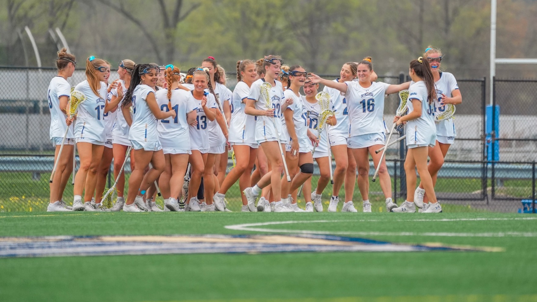 Mount St. Mary's Women's Lacrosse Embraces Each Other after Game