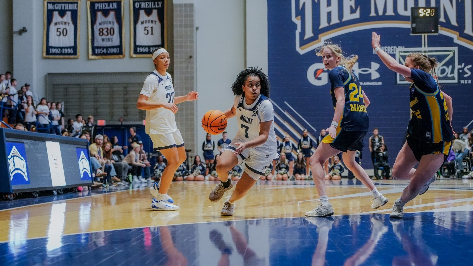 Alana Powell Driving Past Merrimack's Molly Manion
