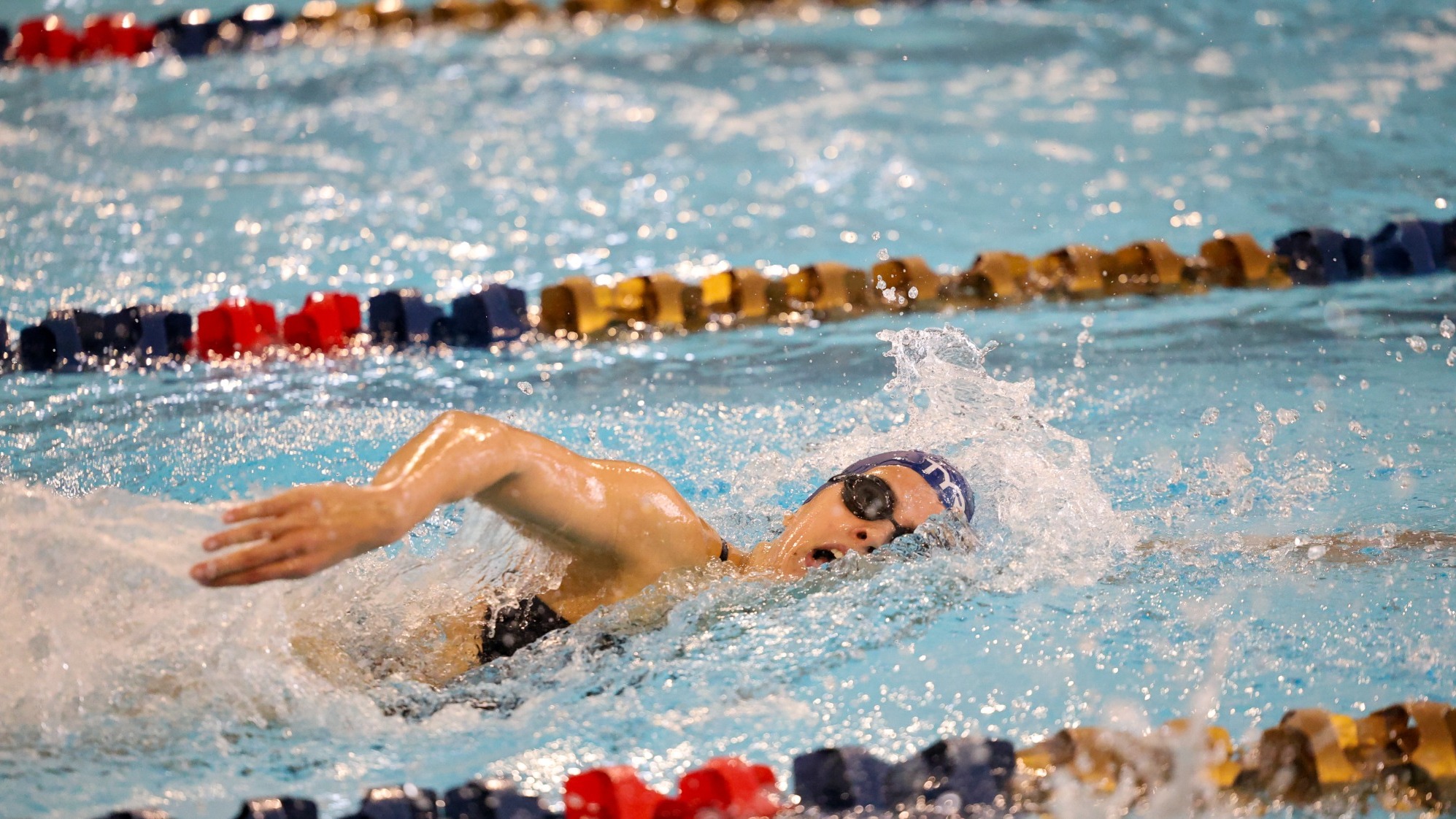 Carmen Del Aguila Swimming against American