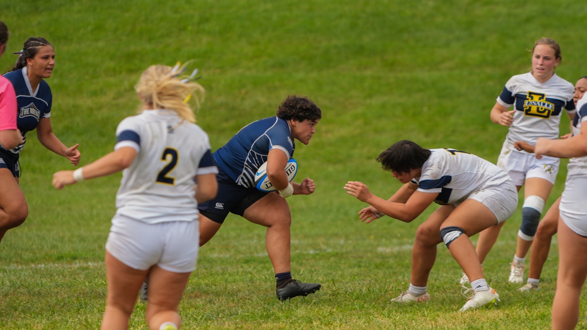 Brie Kindig Charging With Rugby Ball