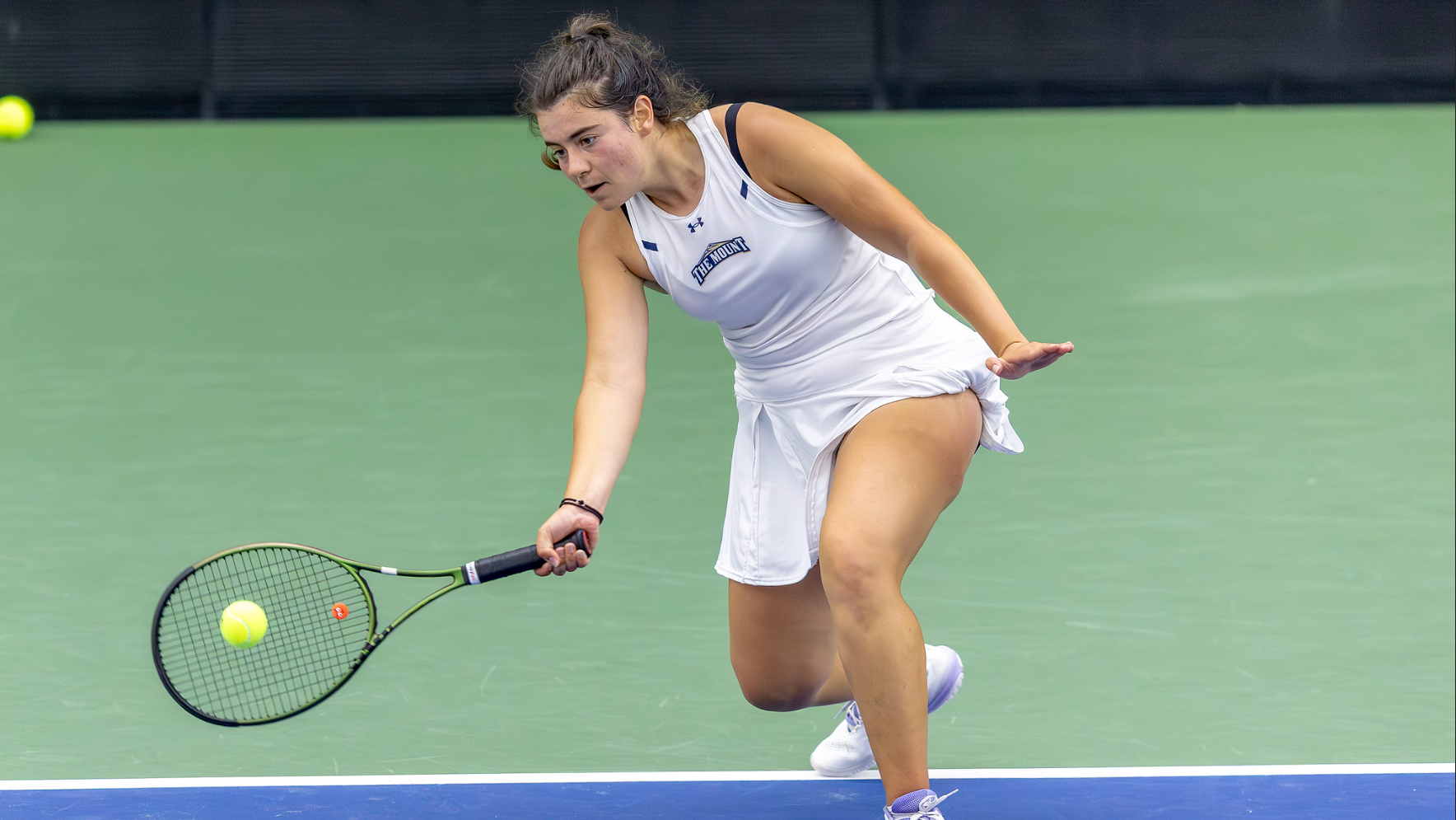 Eirini Tsakiri Hitting a tennis ball