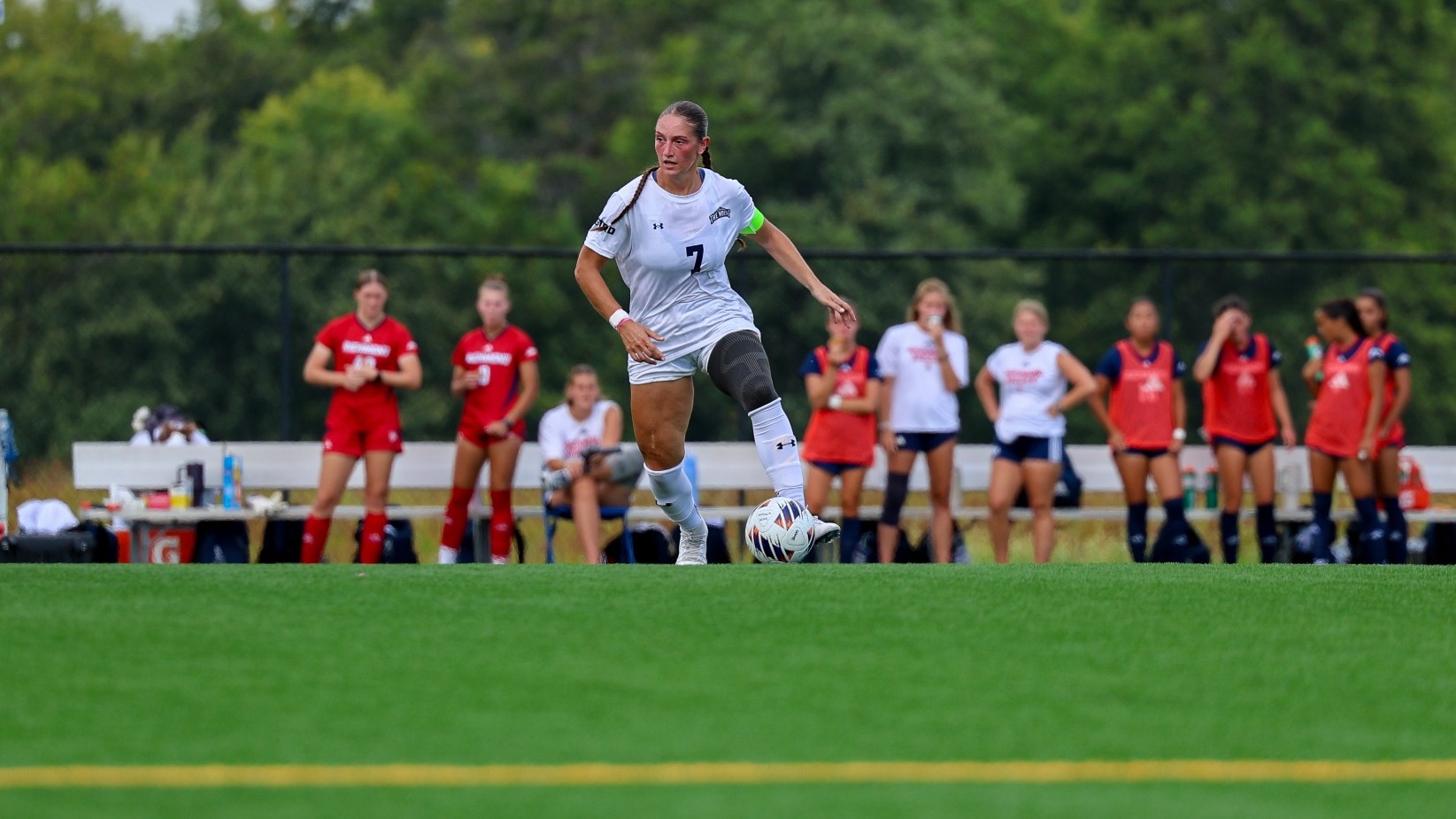 Liliian Young Dribbling in the Field