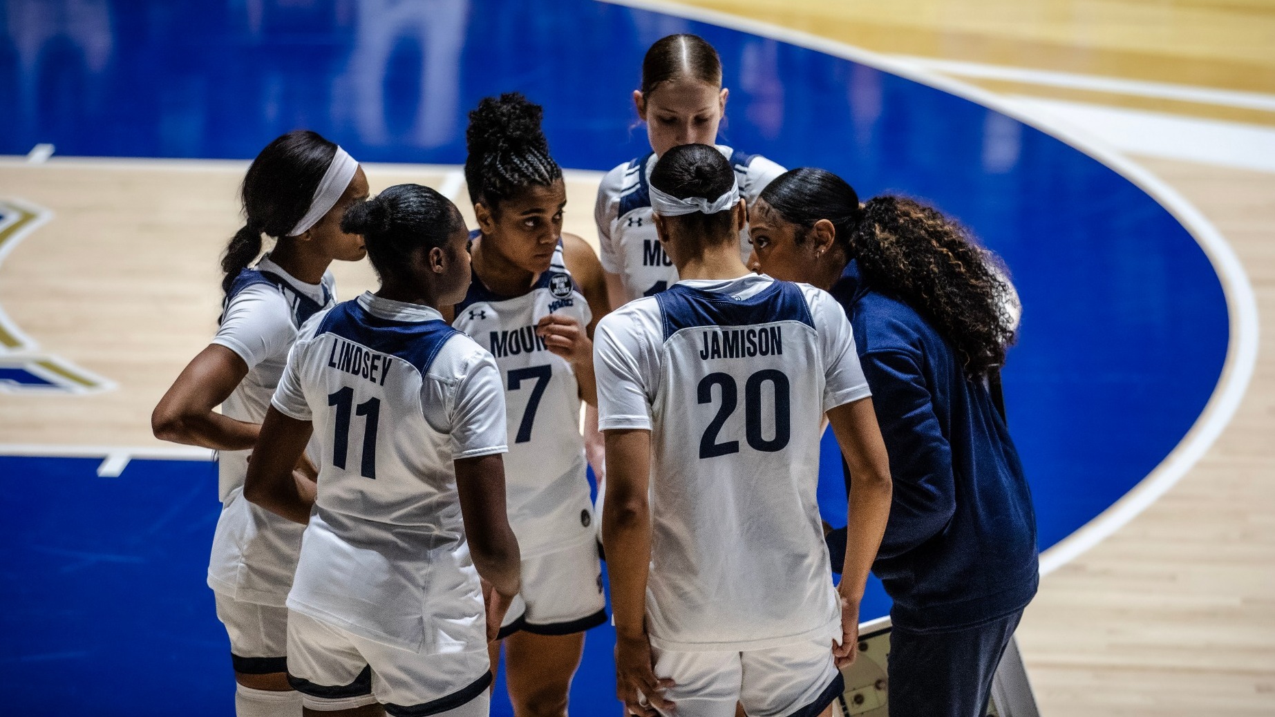 Coach Durjan Issues Instruction to Five Mountaineers