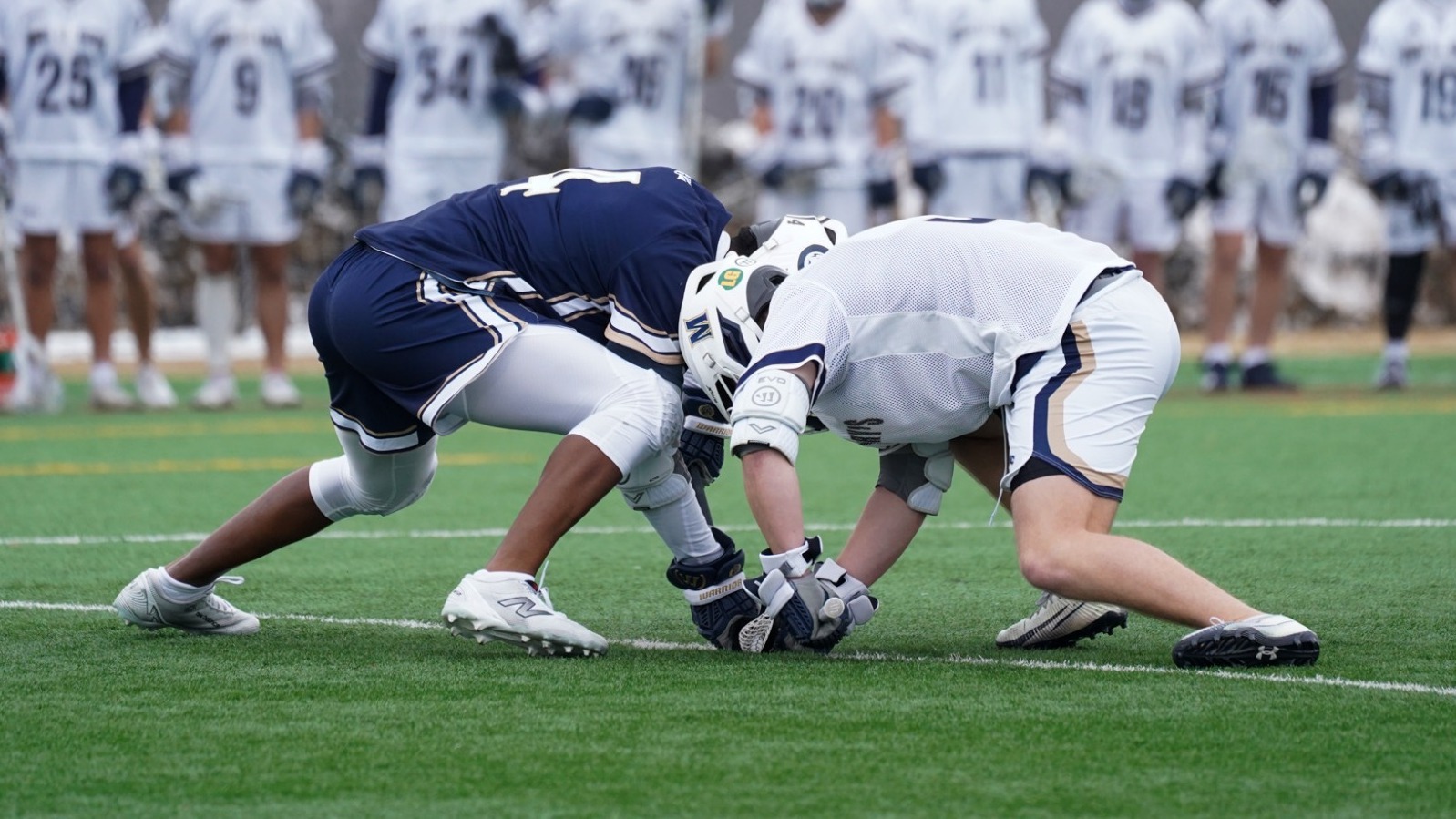 Mountaineer Engaged in a Faceoff