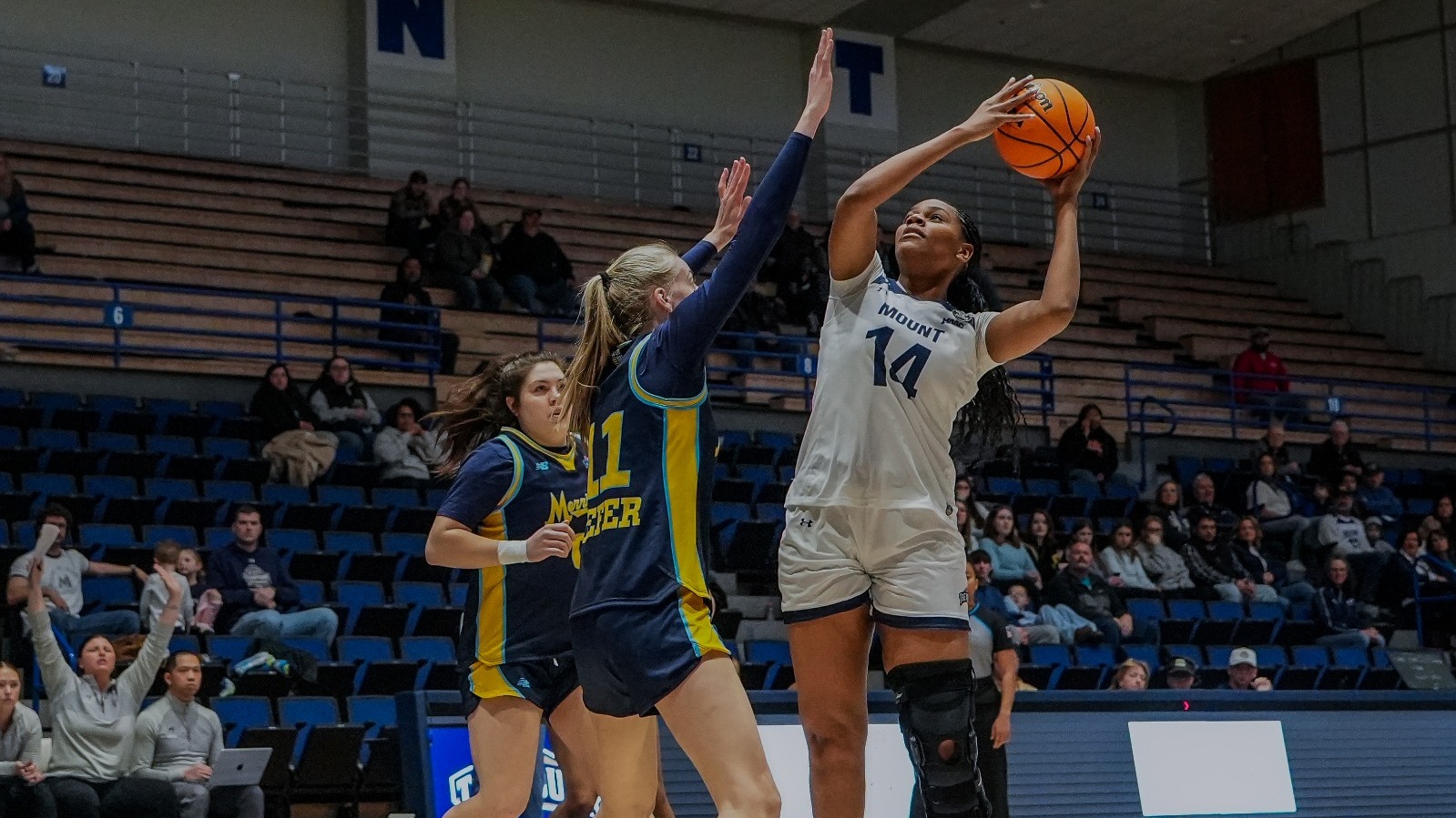 Amber Bullard Challenging a Quinnipiac Defender