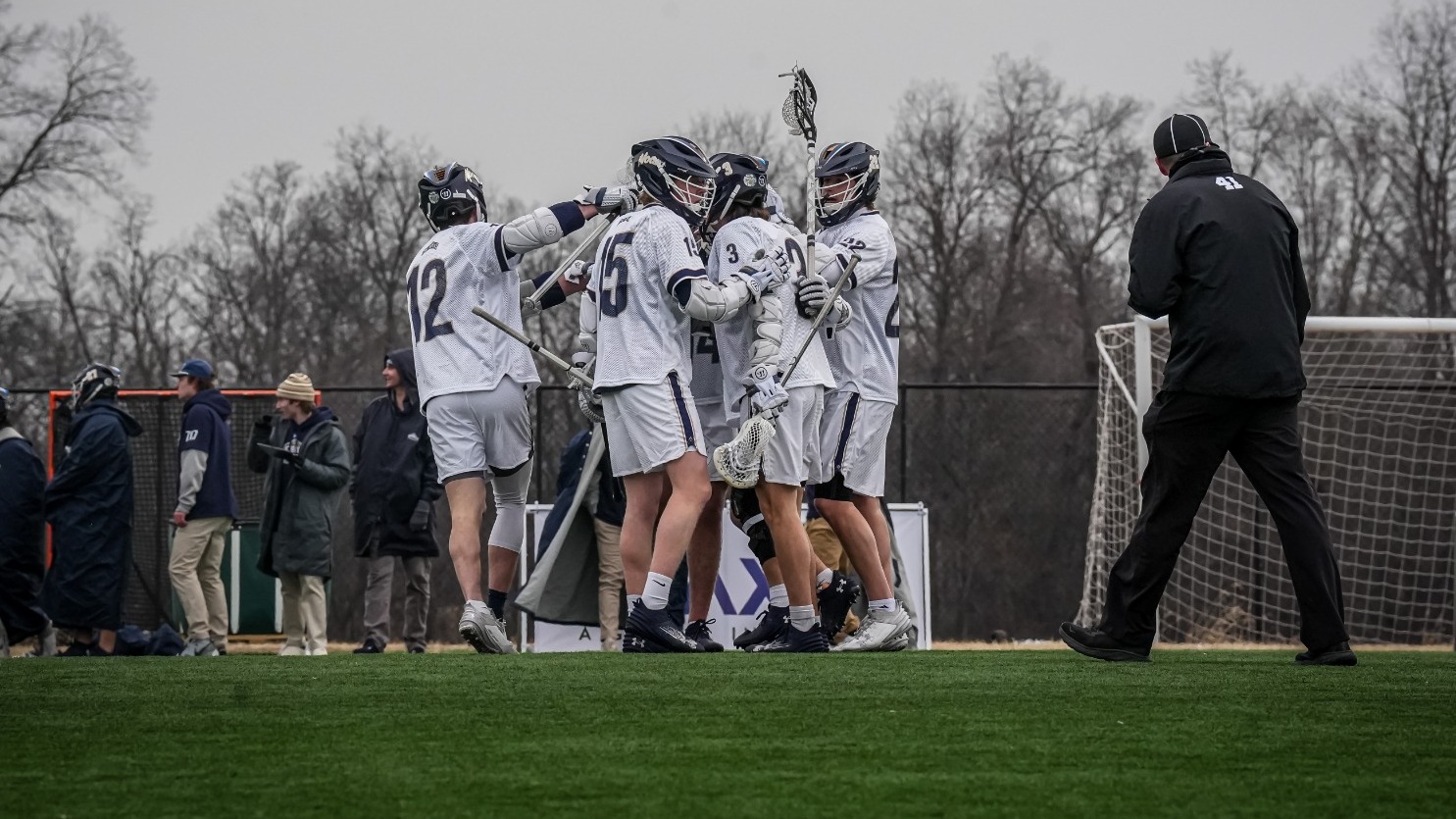 Men's Lacrosse Gathers After a Point Scored