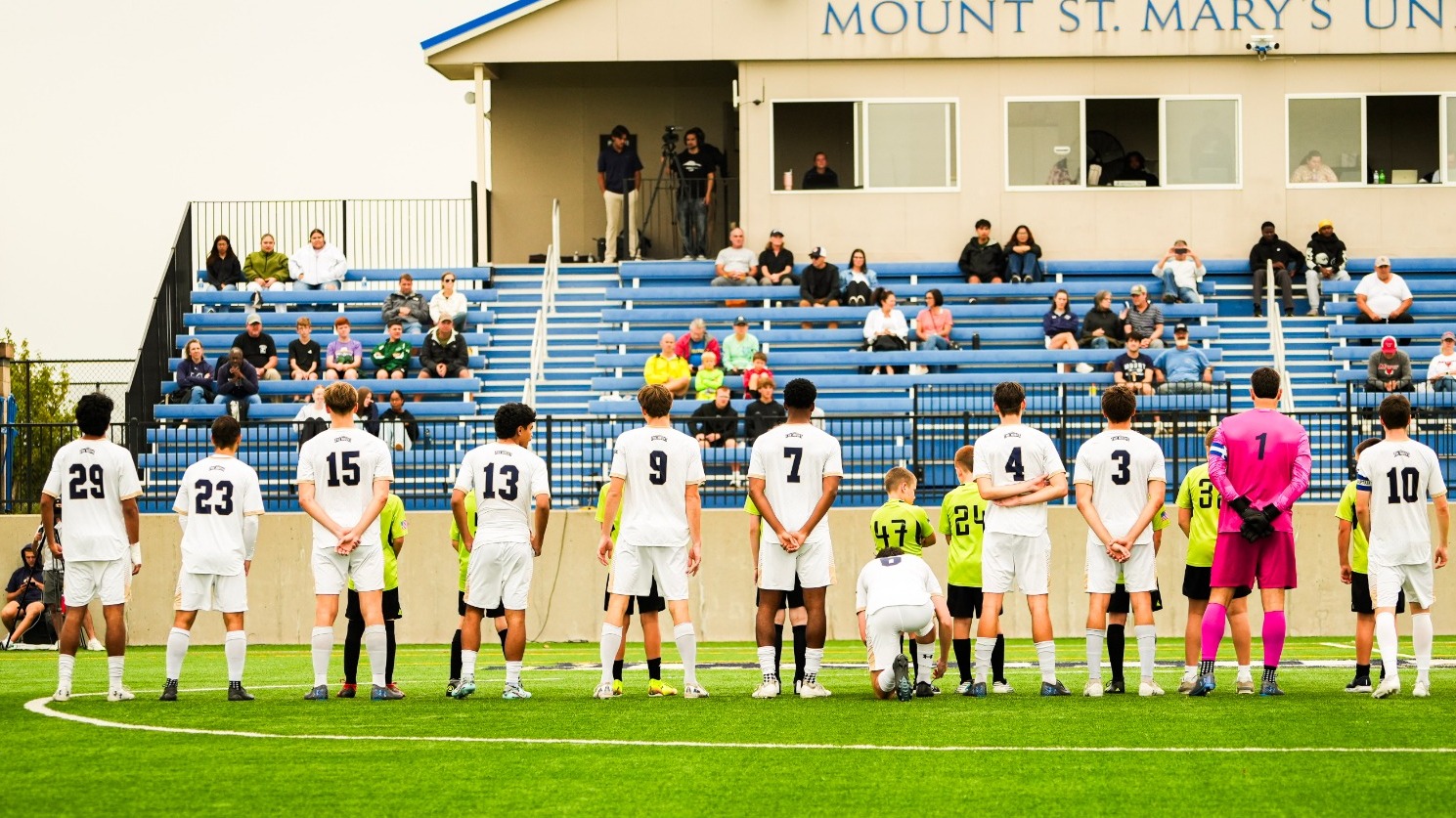 Men's Soccer Players Lined Up for the International Walkout