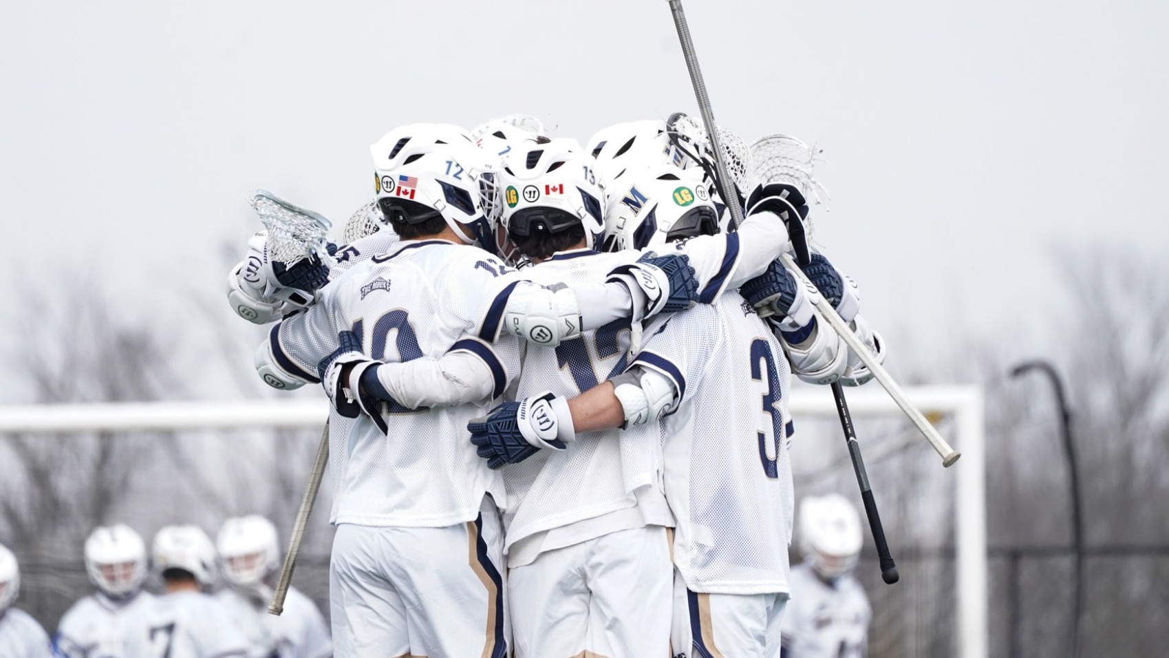 Men's Lacrosse Team Huddle
