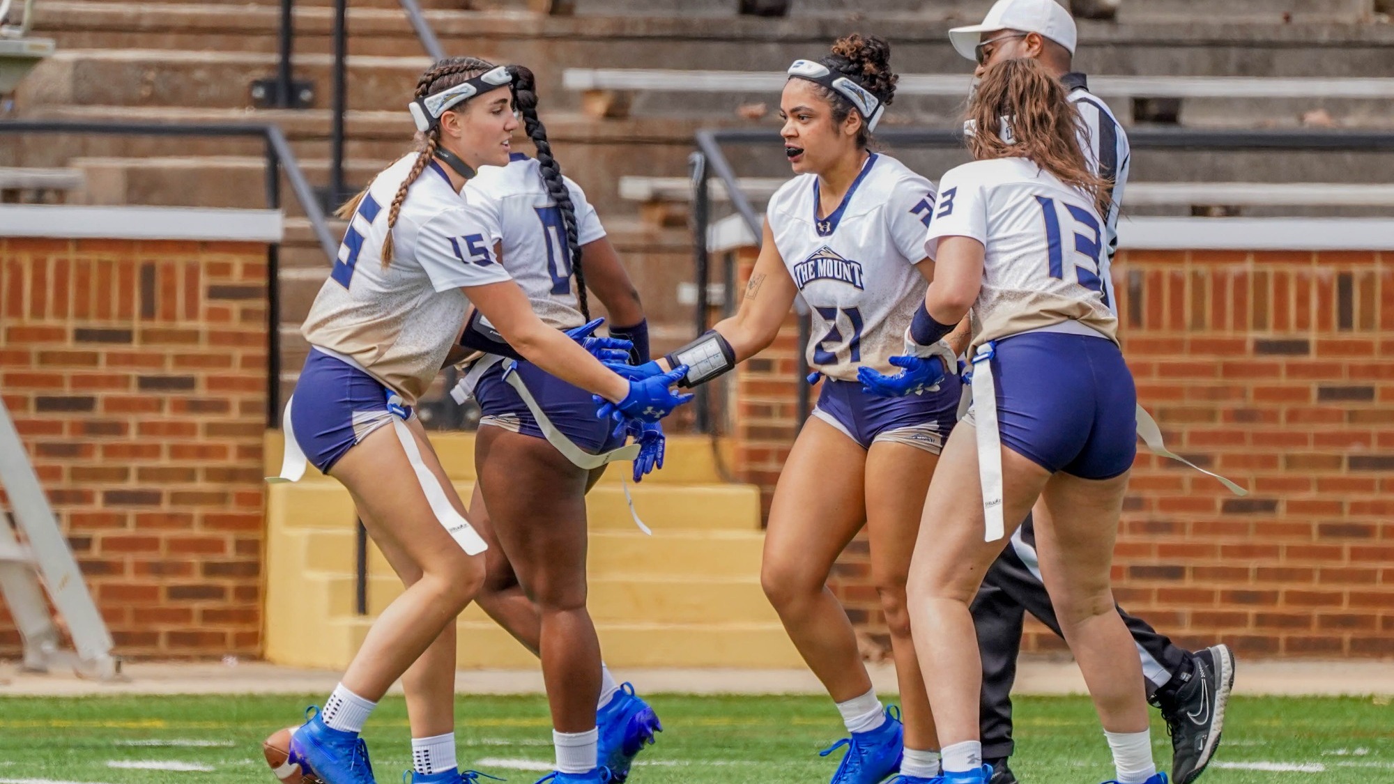 Keira Speikes Receives a High Five from Annabelle Haught