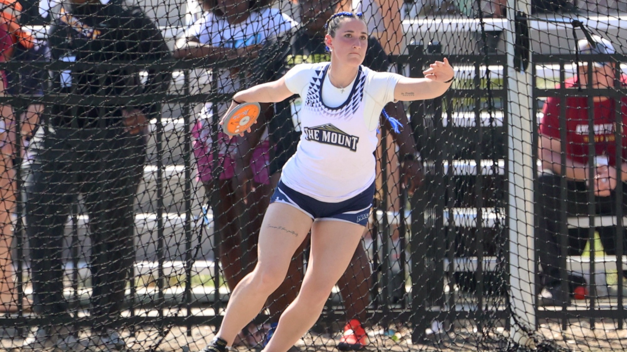 CeCe Bell Throws the Discus at the Shamrock Invitational 