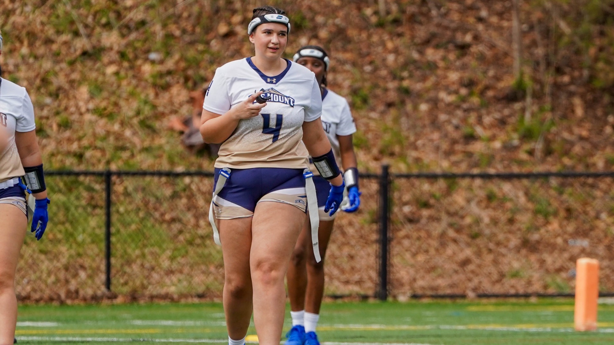 Madison Kean Standing in the Field at Ferrum