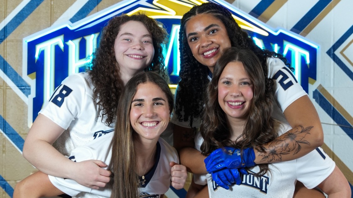Four Flag Football Players Pose at Media Day