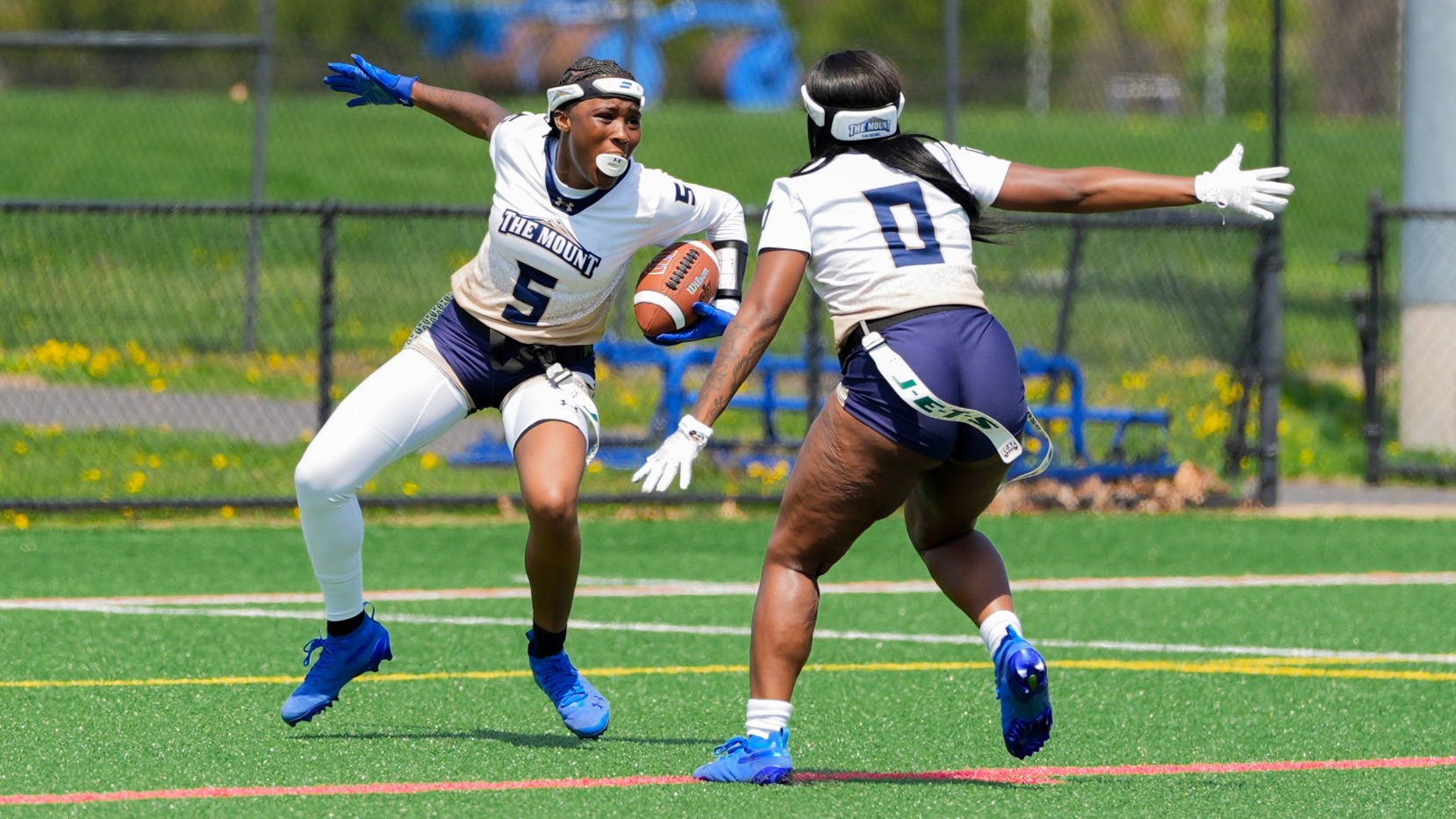 Ace Stokes and Chloe Lover-Omar Celebrate after an Interception