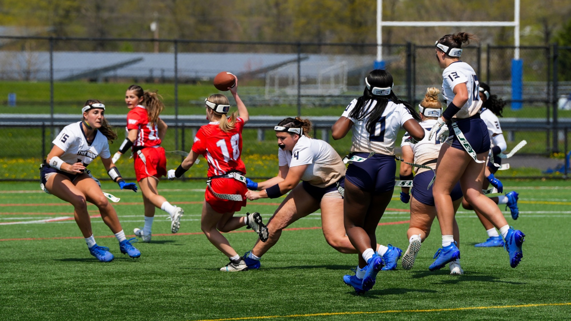Madison Kean Goes for the Flag Pull as the Defense Closes in on Coverage