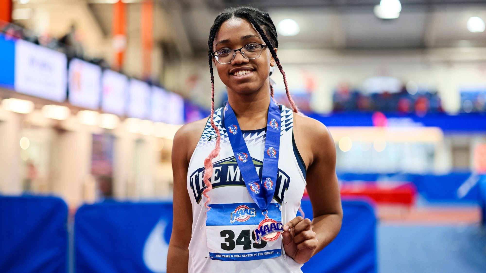 Alena Murray Shows Off Her MAAC Medal