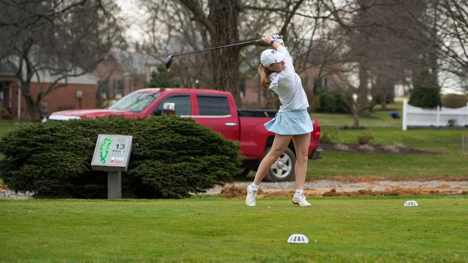 Camryn Hoff Swinging Golf Club