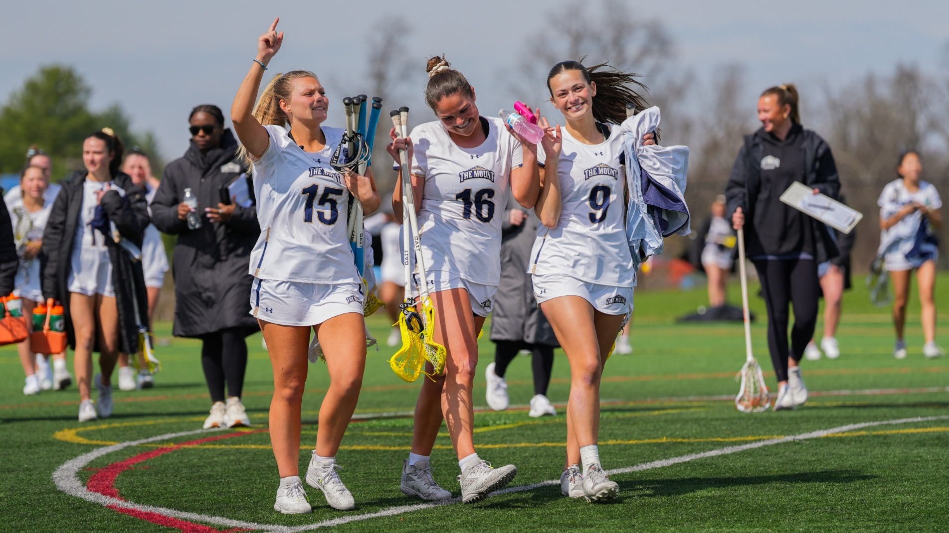 Bittinger, Allingham, and Molchanoff Smile after a Win 