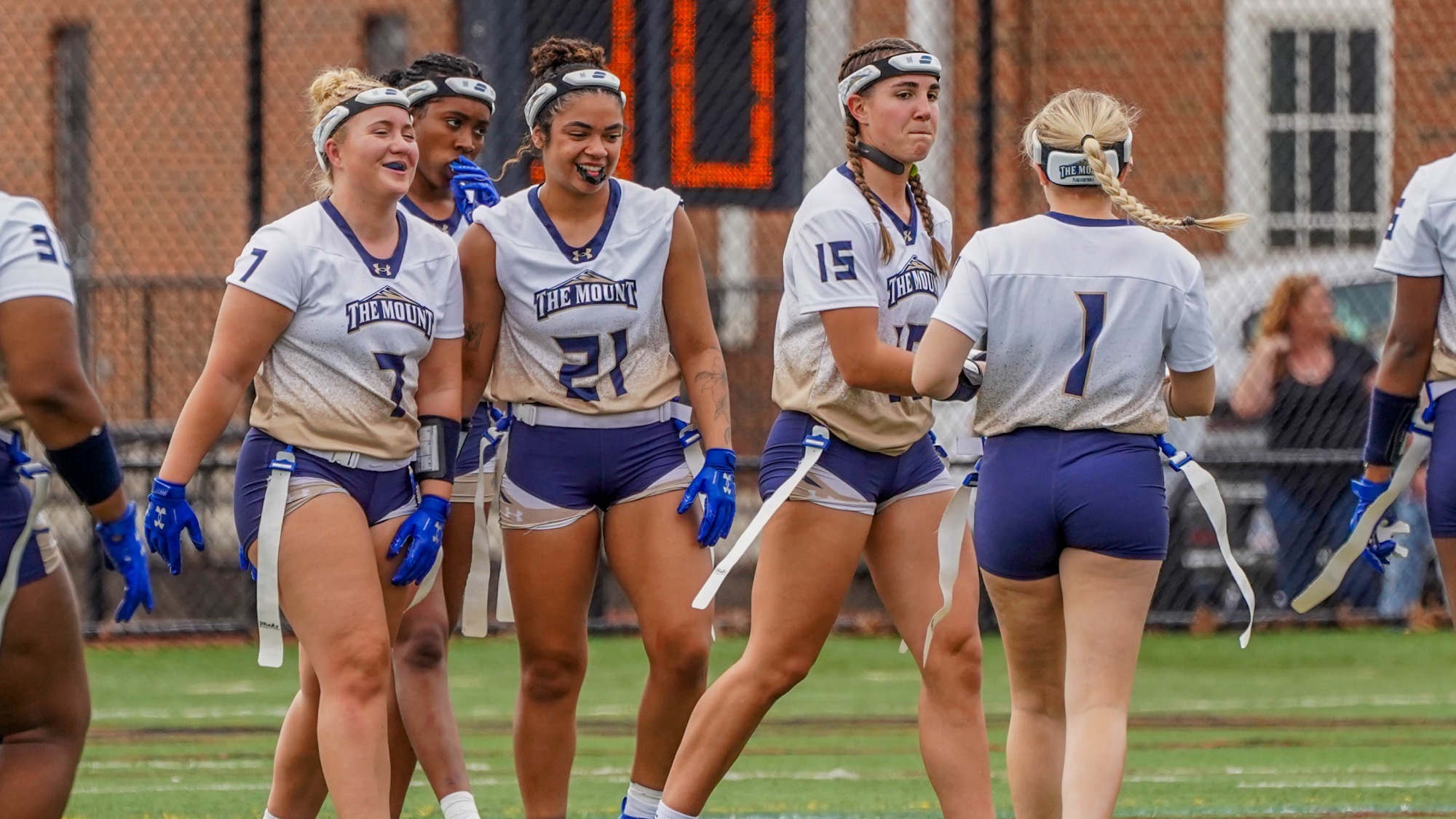 Annabelle Haught Receives Congratulations from Teammates