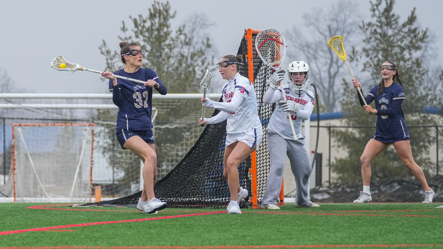 Shannon McTavish Looks to Pass Around a Defender