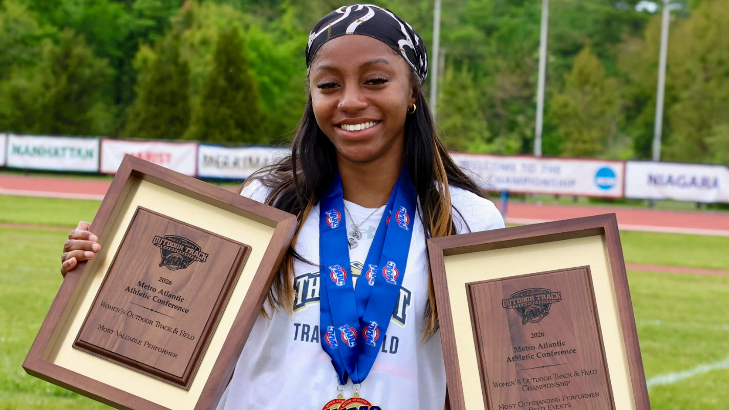 Camryn Jones-Howard with MAAC Placards