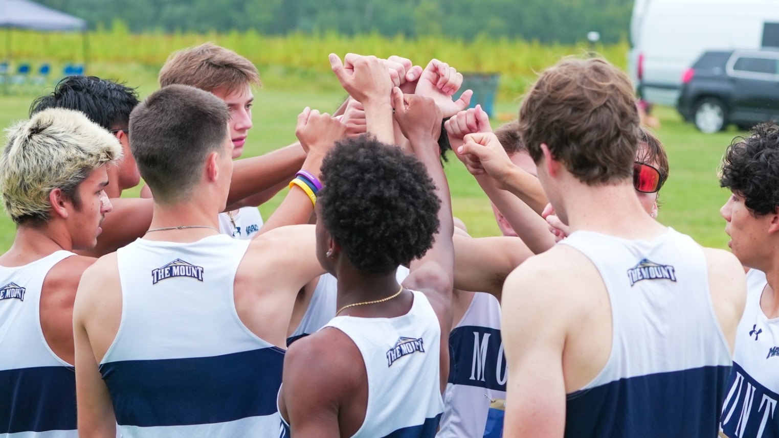 Cross Country Brings Arms Together in a Huddle