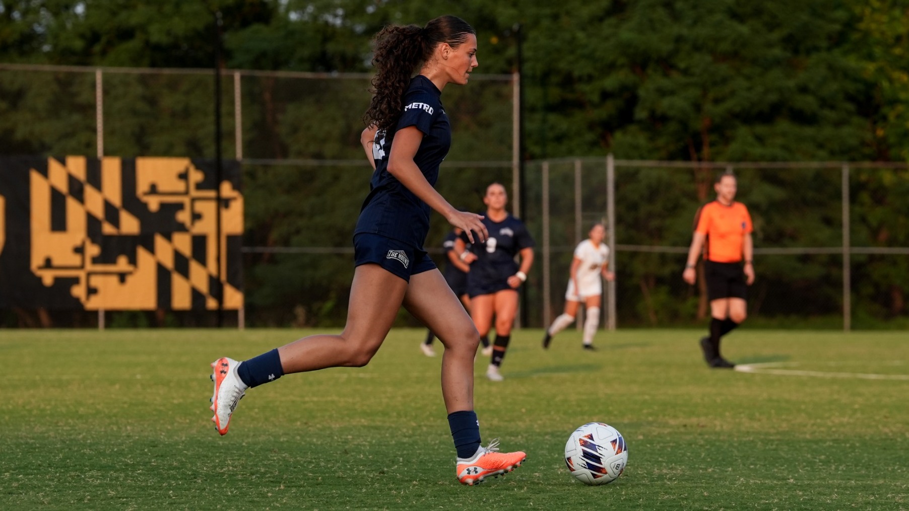 Jessica Ras Dribbling a Ball in Her Mount Debut