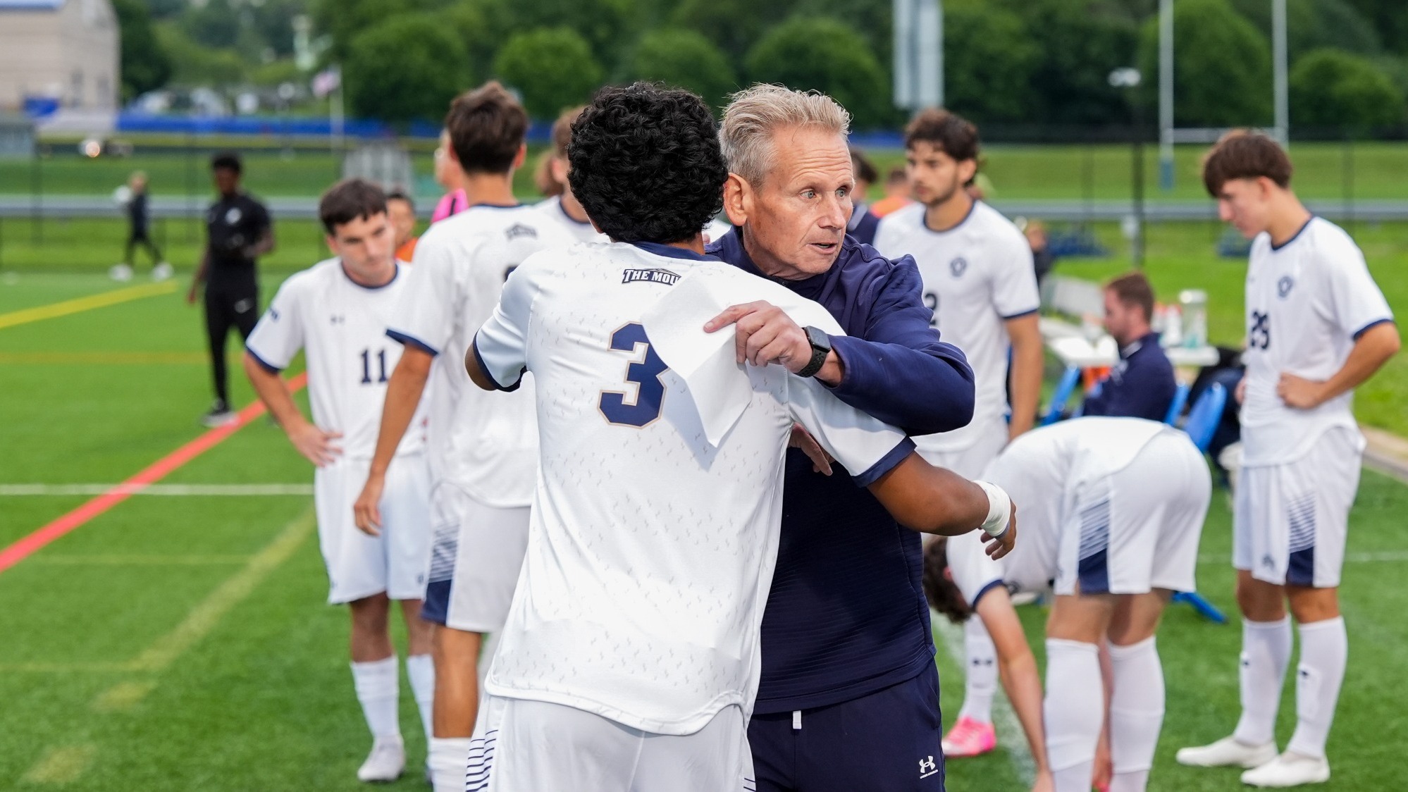 Brett Teach Embracing Christian Kyriacou