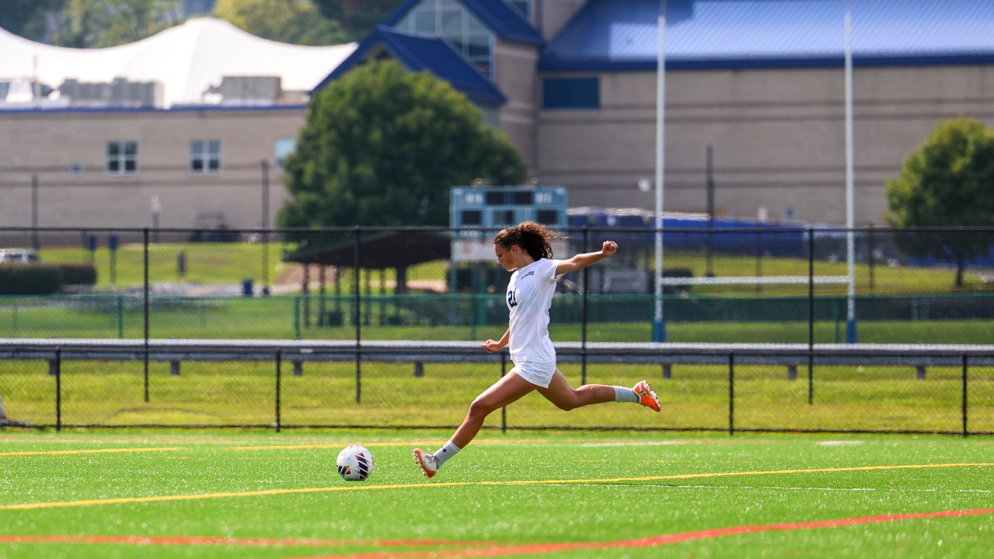 Jessica Ras Kicking Ball