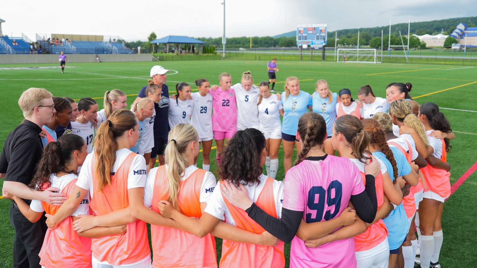 Mount St. Mary's Women's Soccer in a Team Huddle